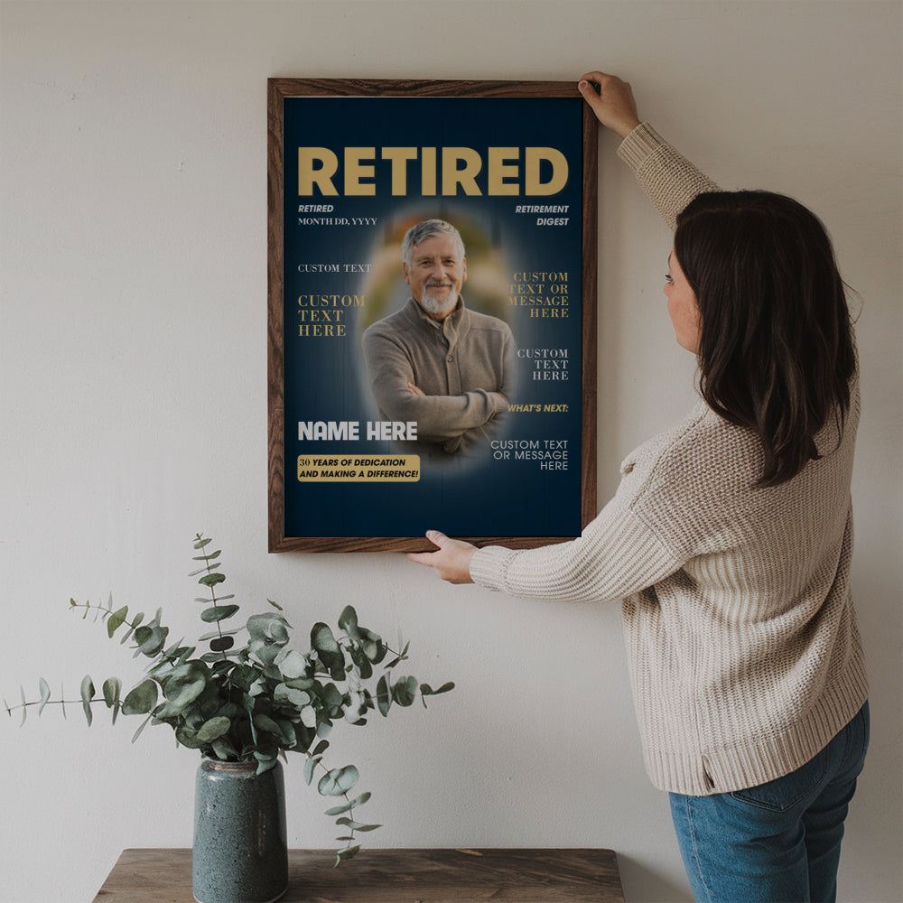 Custom Photo Retired Magazine poster, a woman hanging the framed print on a wall