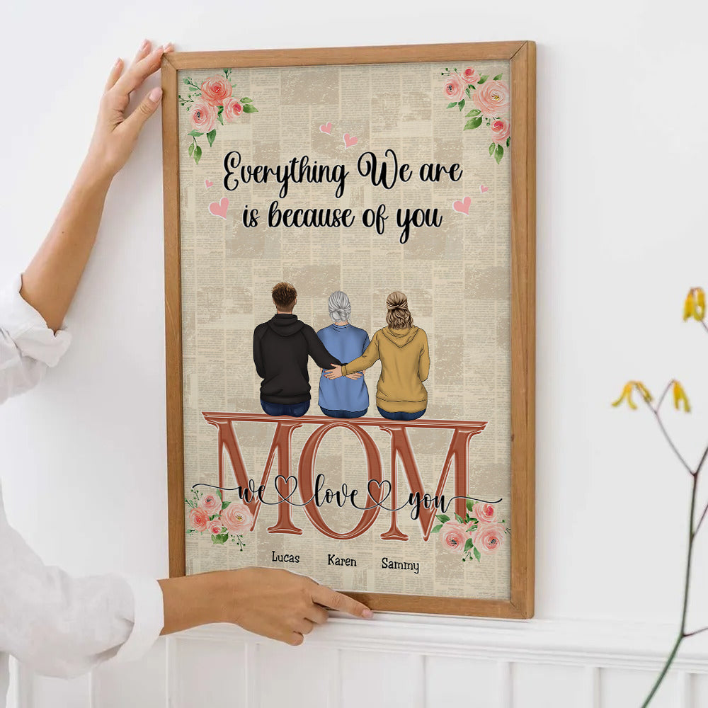 Mom's Personalized Canvas Print: "Everything We Are" Custom Character poster, framed in a bright living room