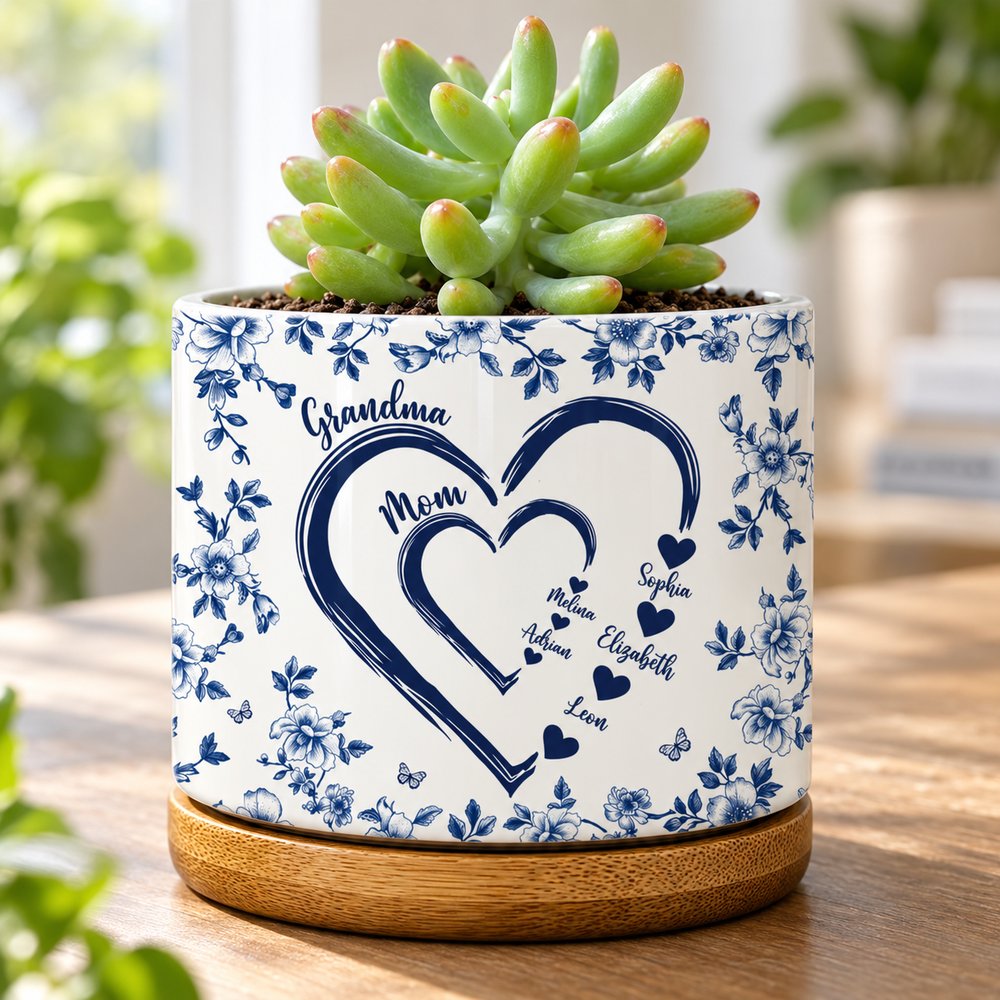 Close up detail of floral print and custom names on ceramic plant pot
