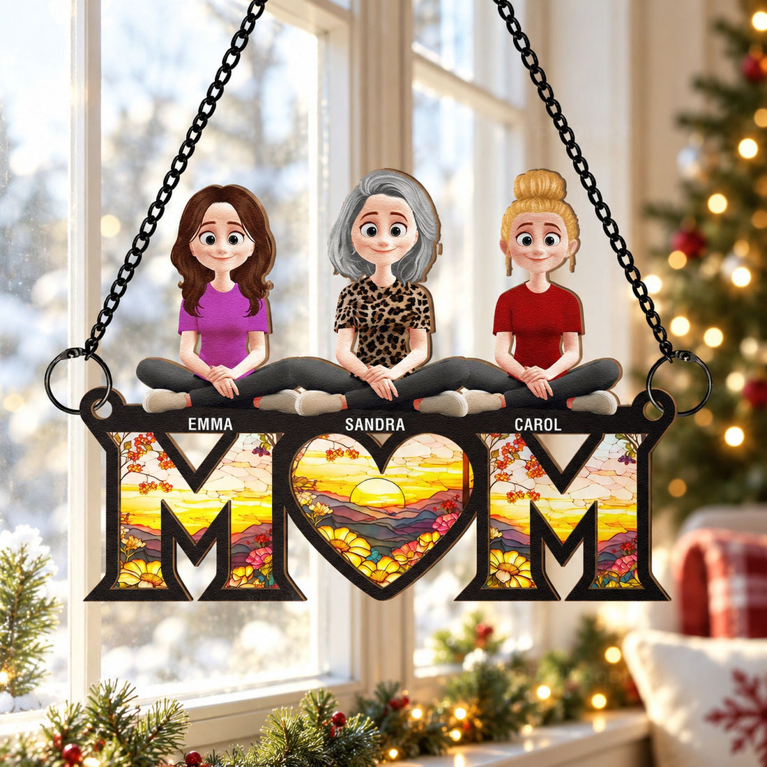 Mom and daughters window suncatcher hanging near festive holiday window and Christmas tree