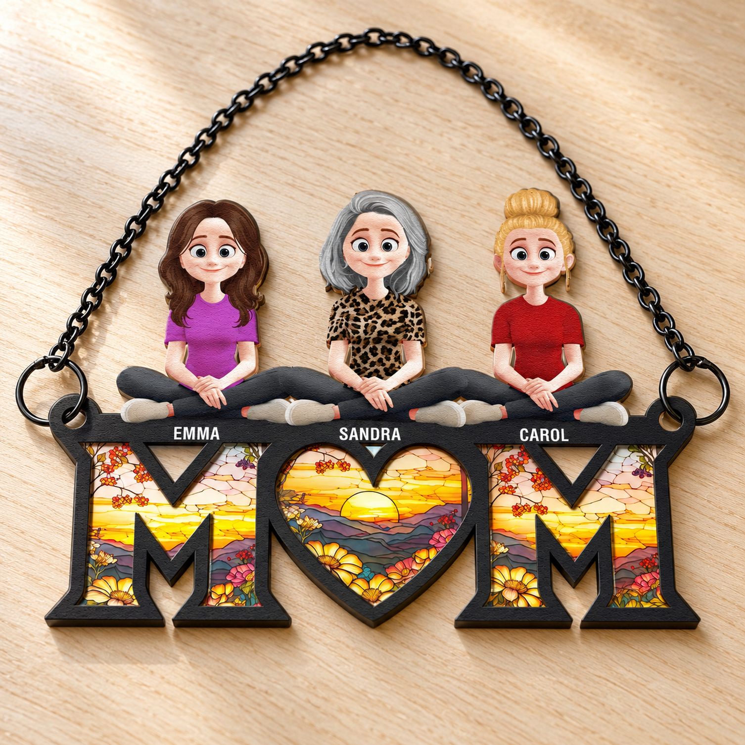 Close up detail of layered wood and stained glass effect acrylic Mom suncatcher ornament