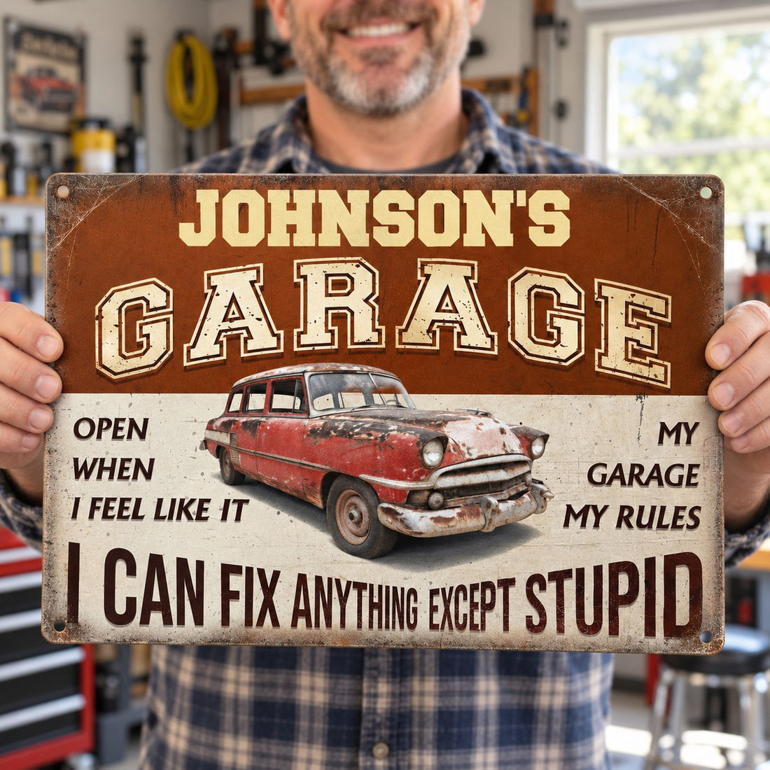 Dad happily holding his personalized My Garage My Rules vintage style metal sign