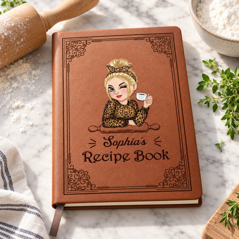 Personalized brown leather recipe cookbook journal on a kitchen counter with baking ingredients
