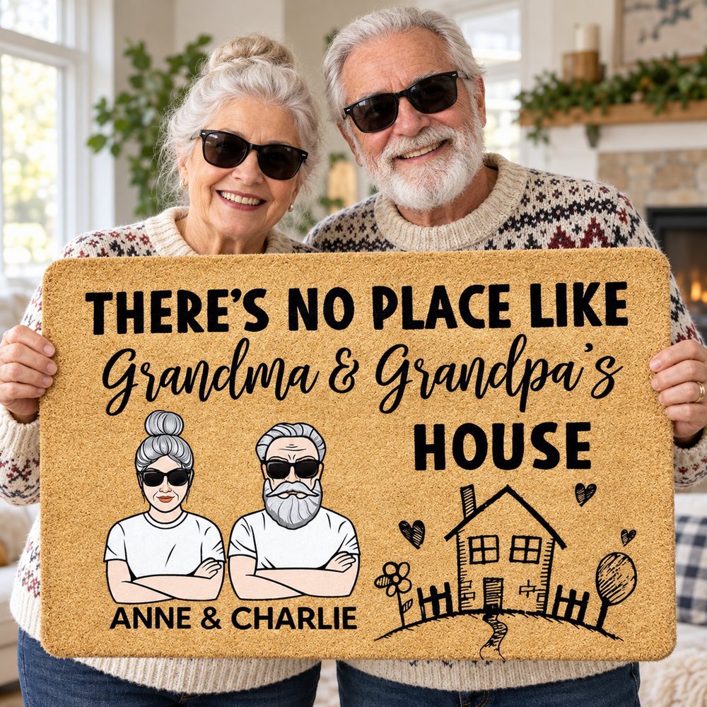 Grandparents happily holding their personalized Anne and Charlie house doormat