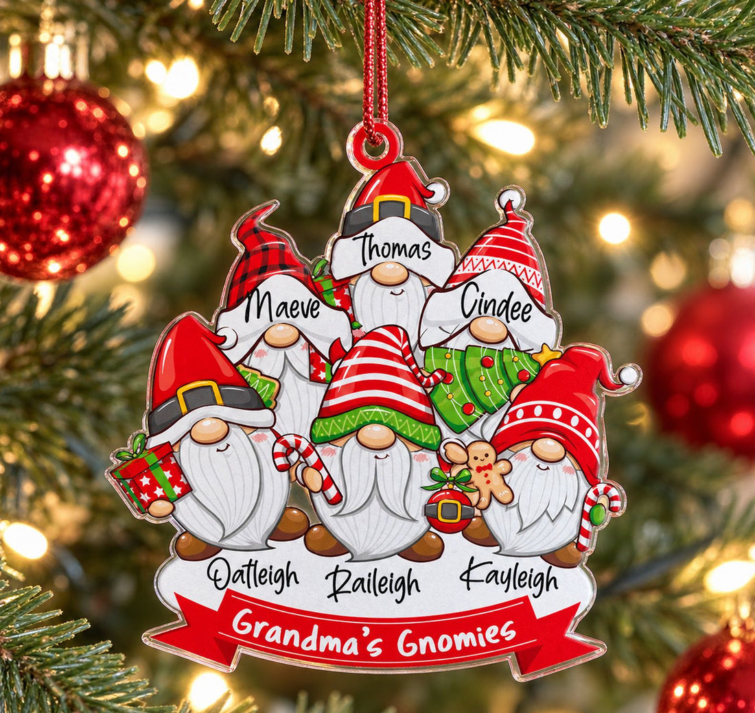 Personalized Christmas family gnome acrylic ornament hanging on a decorated Christmas tree branch