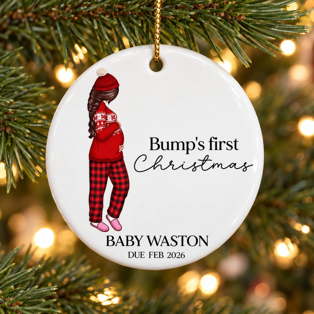 Personalized pregnant mom ceramic ornament hanging on a green Christmas tree branch