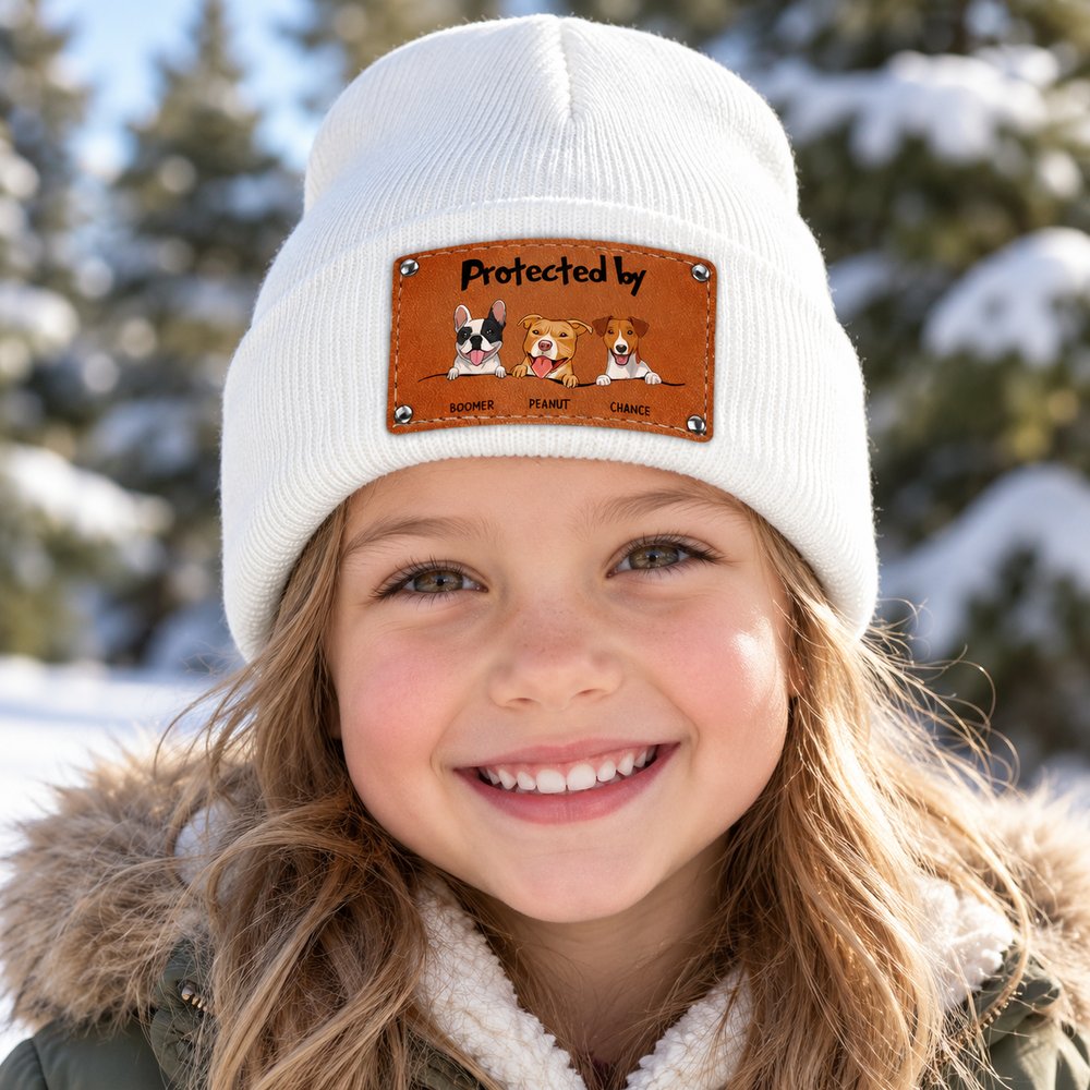 Child wearing Personalized Protected By Dog Leather Knitted Beanie outdoors in winter