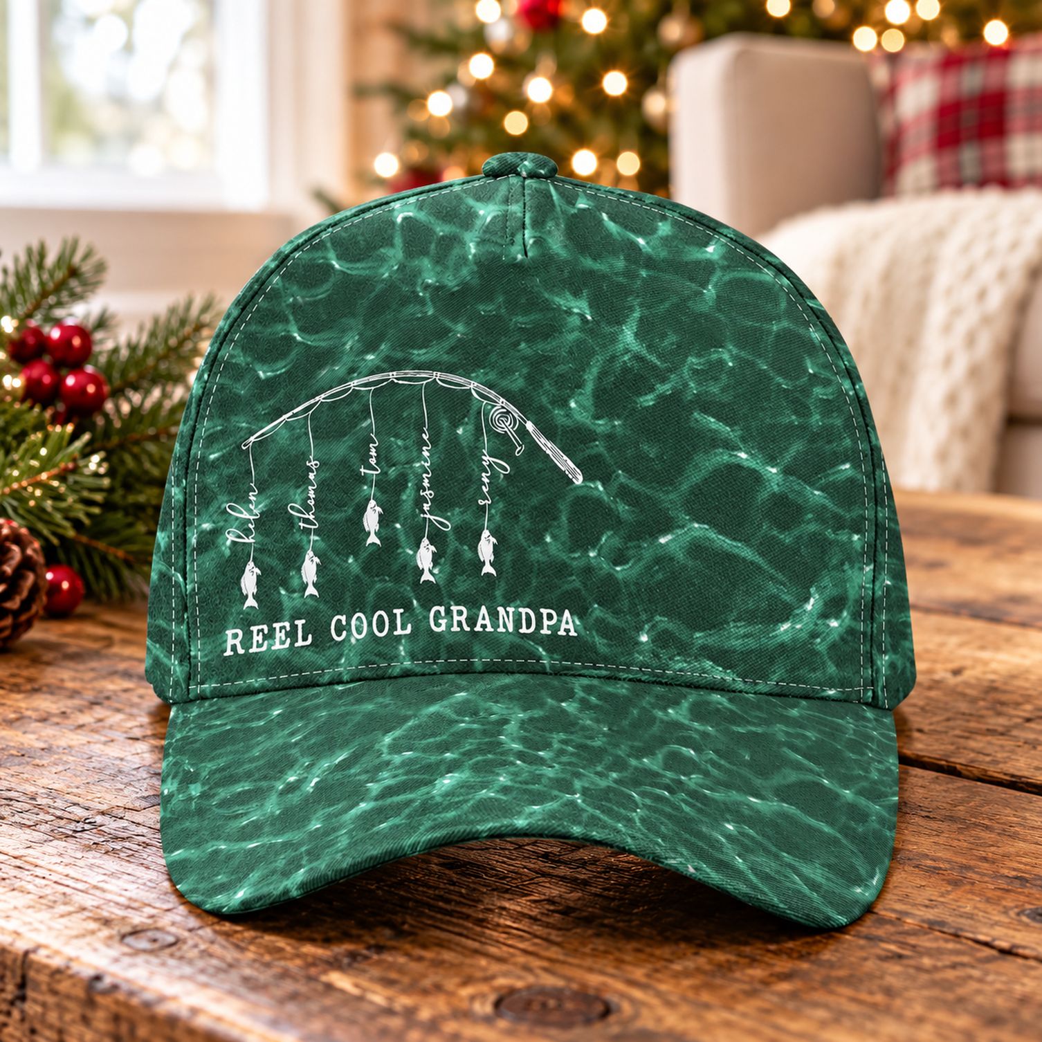 Reel Cool Grandpa fishing classic cap on a holiday table with Christmas tree in background