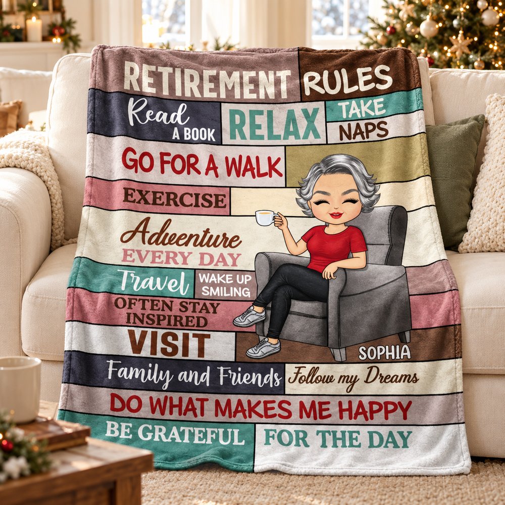 Personalized Retirement Rules fleece blanket draped on a cozy living room sofa near a Christmas tree