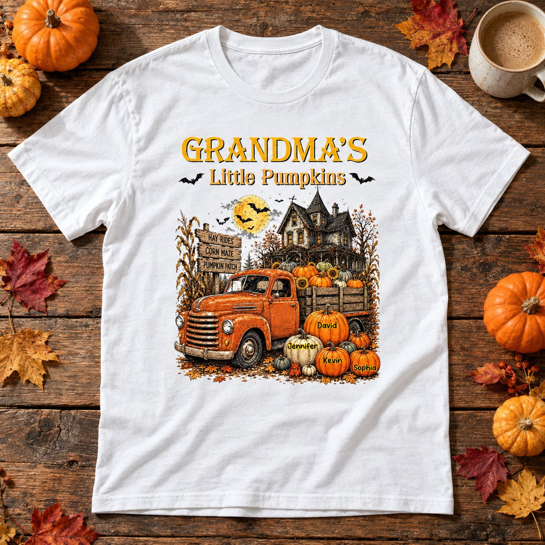 Personalized Grandma's Little Pumpkins t-shirt flat lay with fall leaves and mini pumpkins