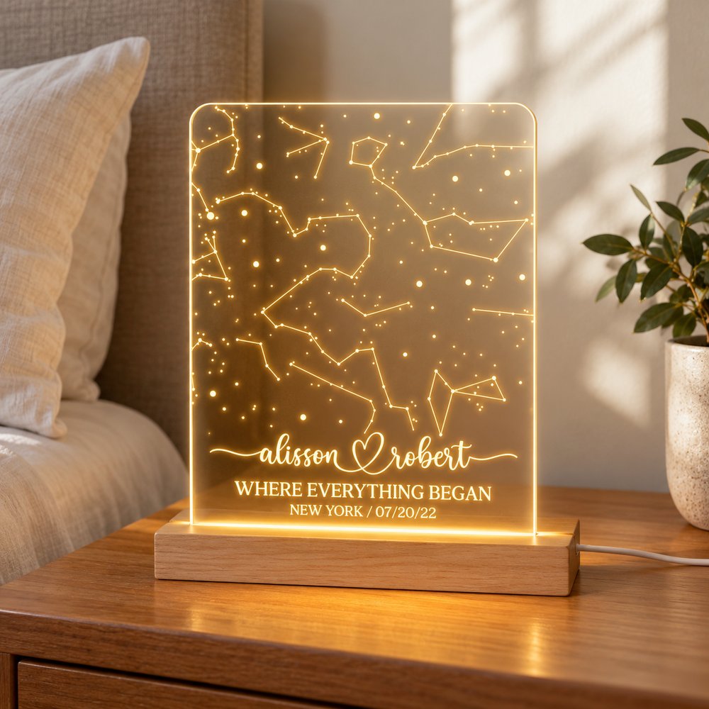 Custom constellation chart night light displayed on a cozy bedroom nightstand