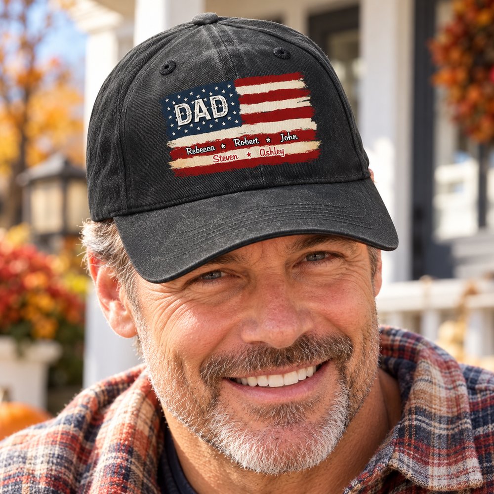 Dad wearing personalized US flag DAD vintage washed black denim cap on a bright porch