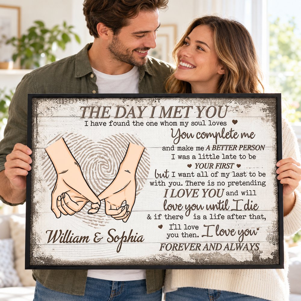 Happy couple holding their personalized The Day I Met You pinky promise wall art gift