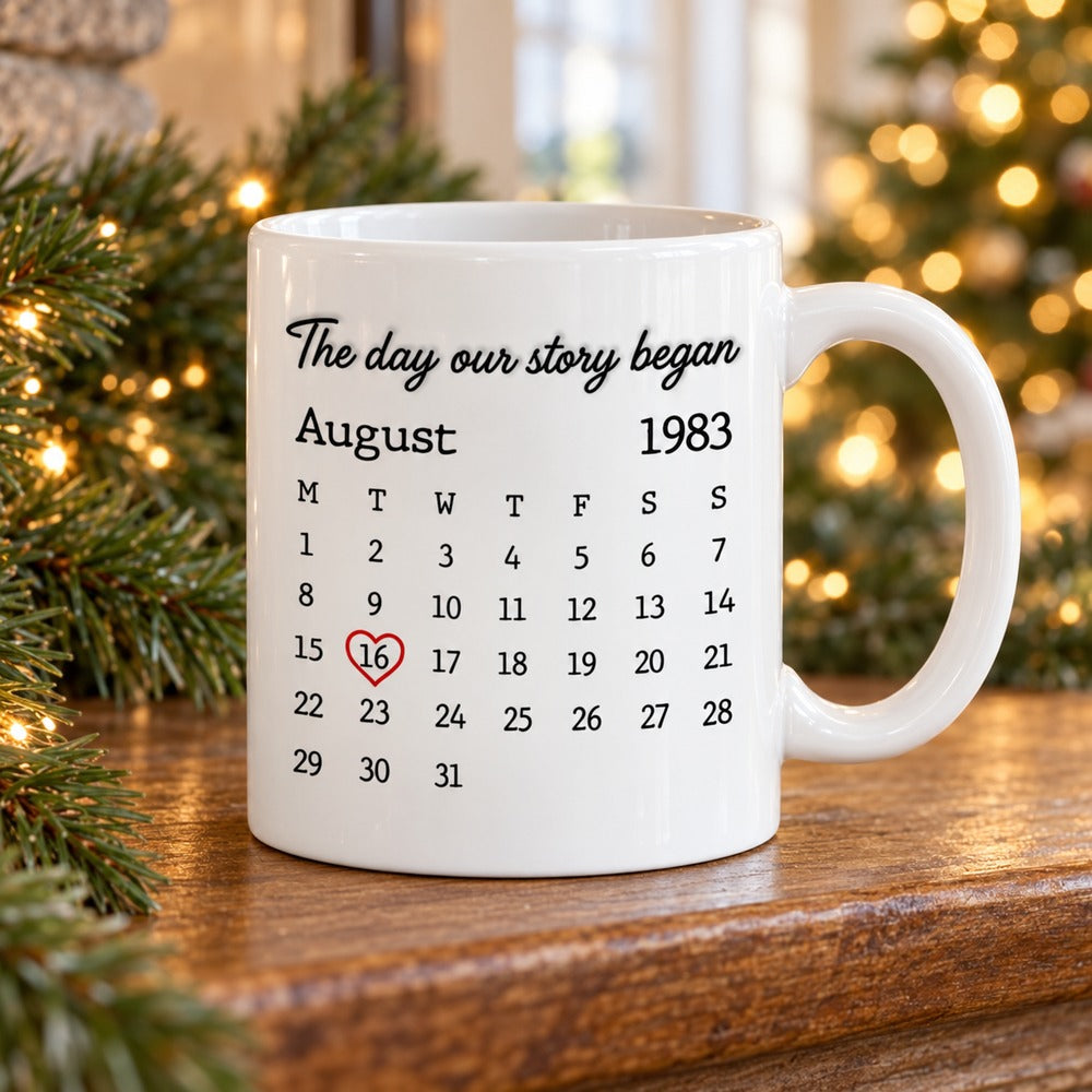 Personalized couple anniversary calendar mug on holiday mantel with pine greenery