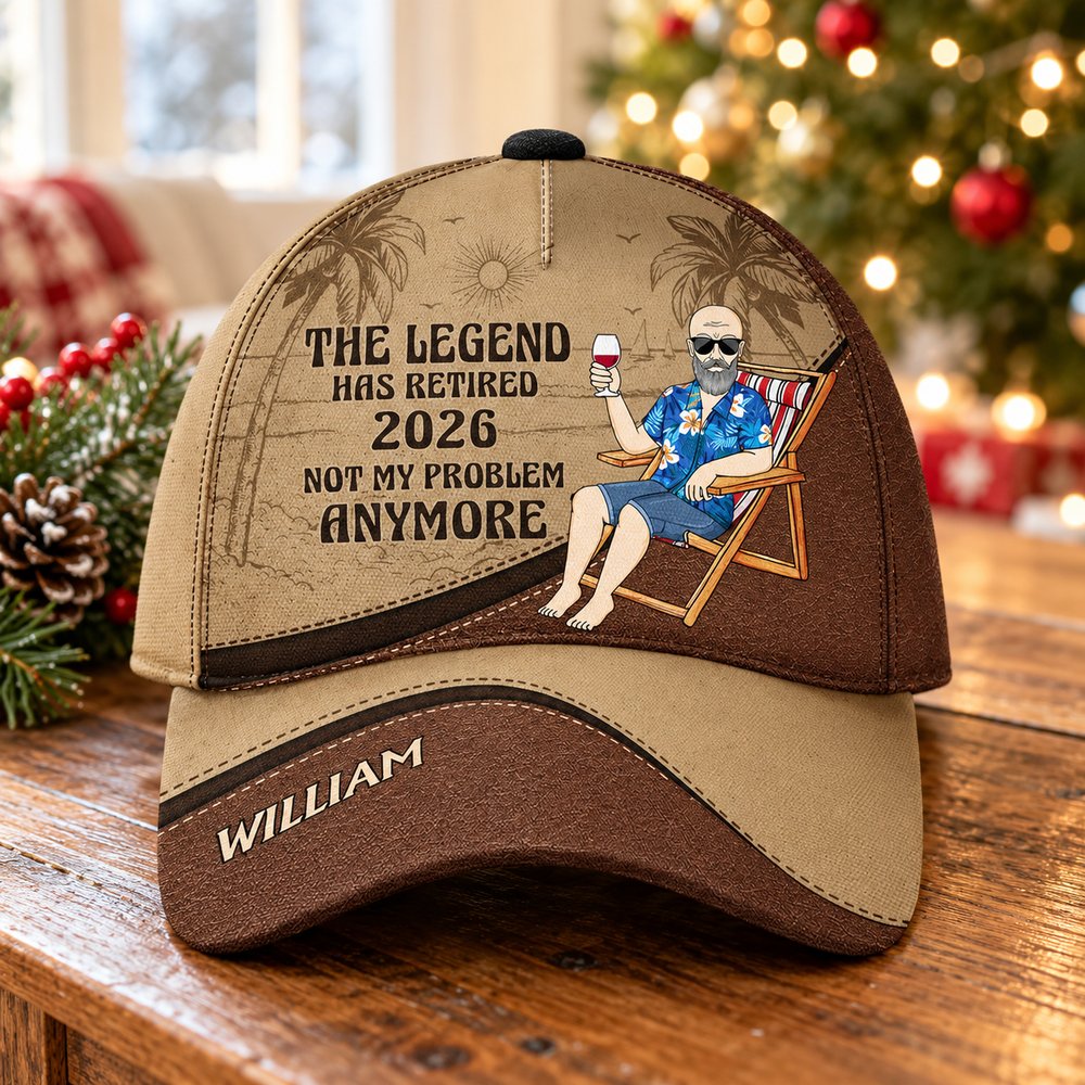 The Legend Has Retired personalized classic cap on wooden table with Christmas decor