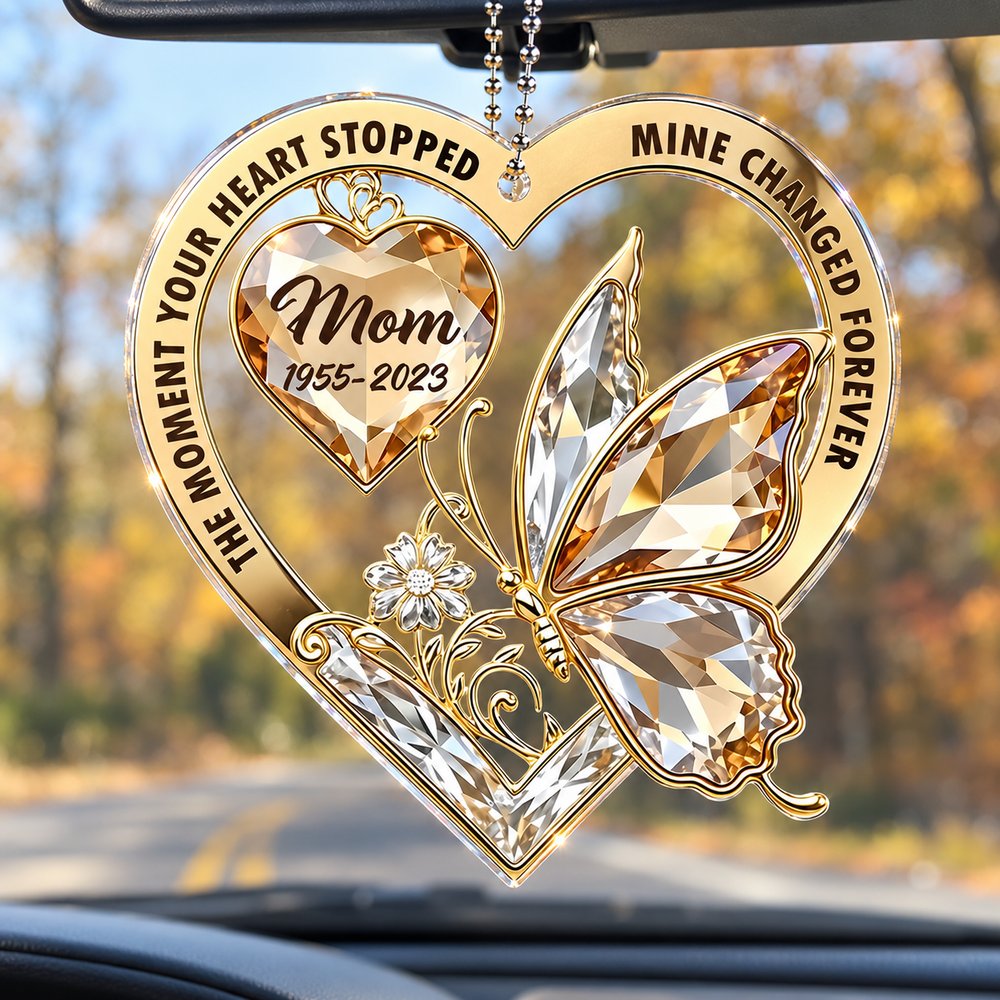 Personalized memorial acrylic car hanger for Mom hanging from a car rearview mirror in daylight