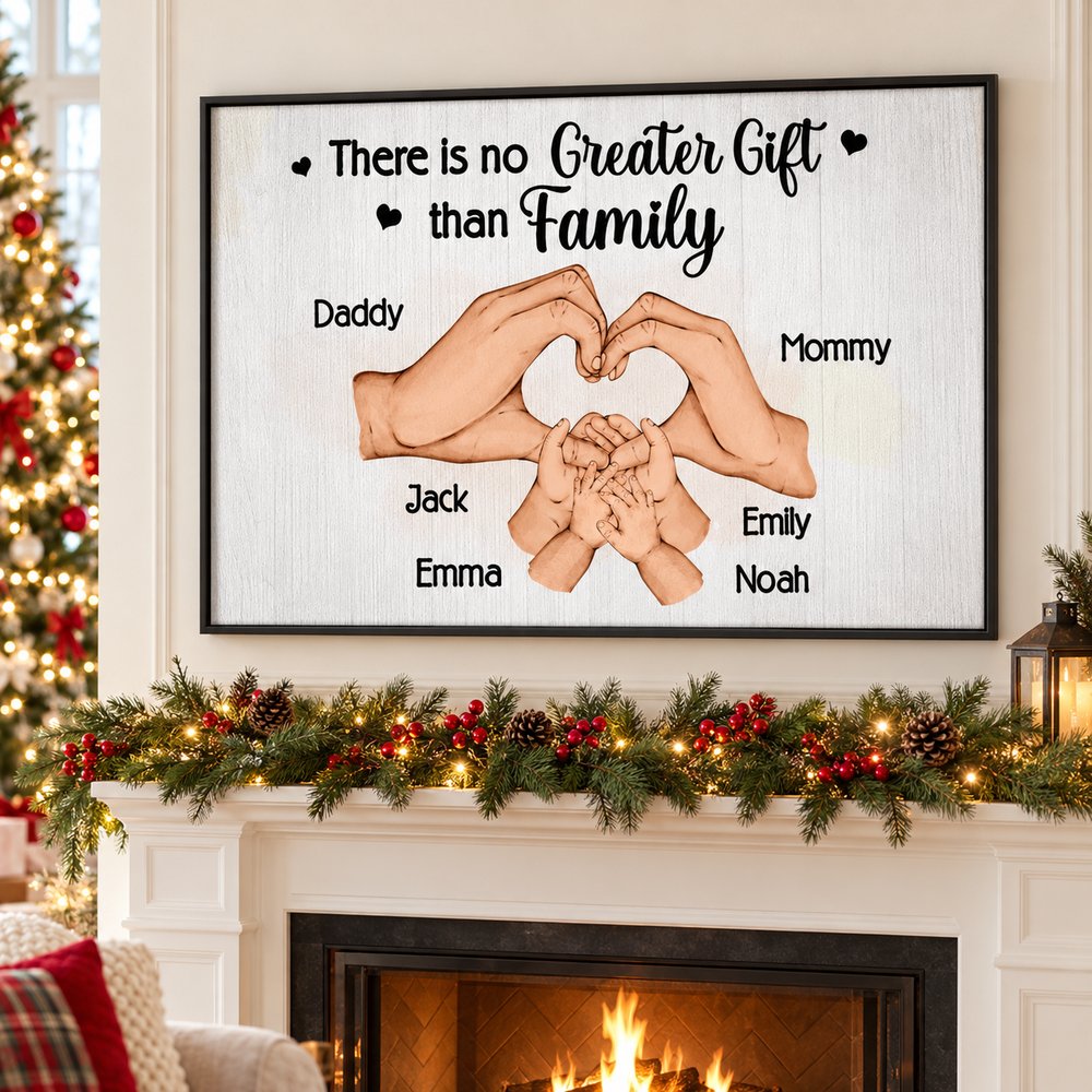 Family Hand Heart custom canvas print hanging above a holiday mantel with pine garland
