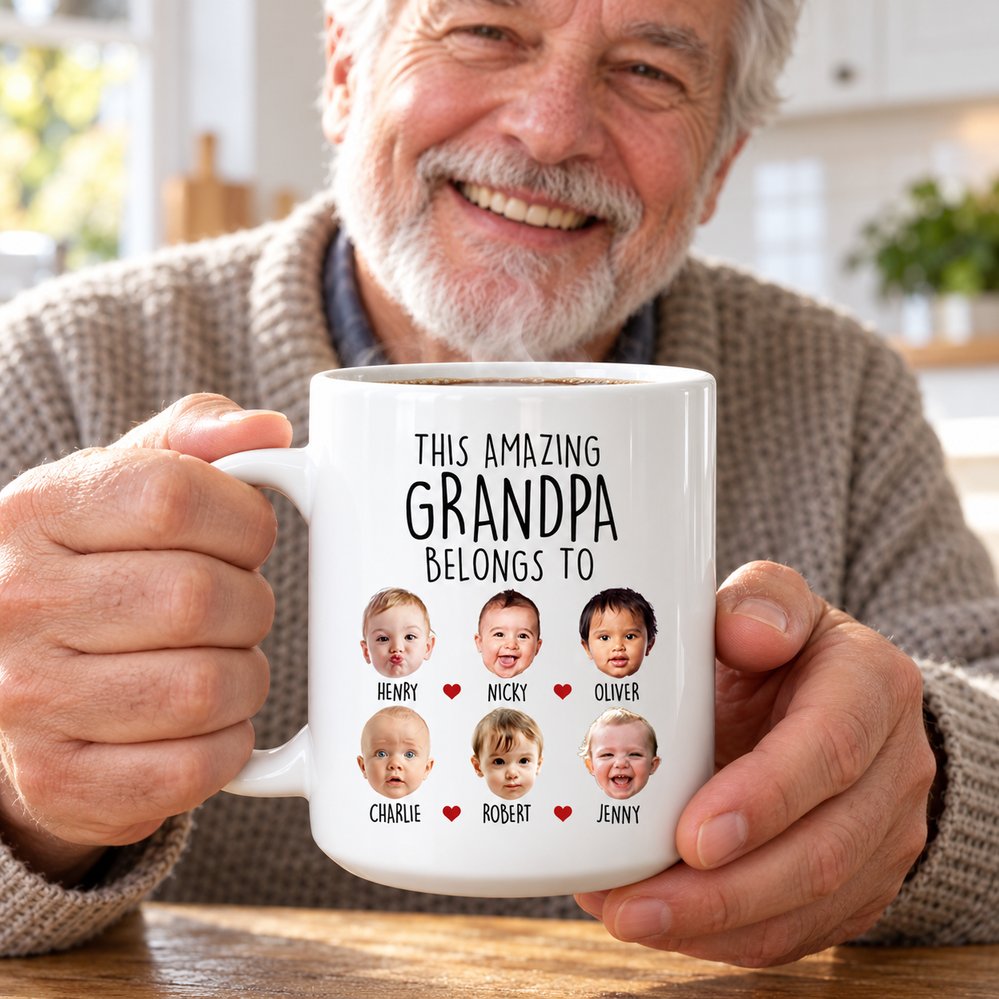 Grandpa holding personalized This Amazing Grandpa Belongs To photo coffee mug with steam rising