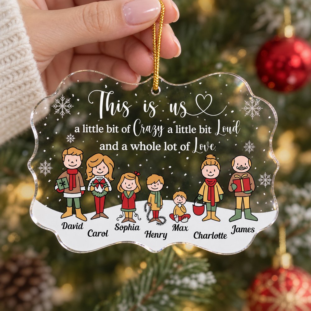 Personalized This Is Us medallion acrylic ornament held in hand to show 4x2.75 inch size