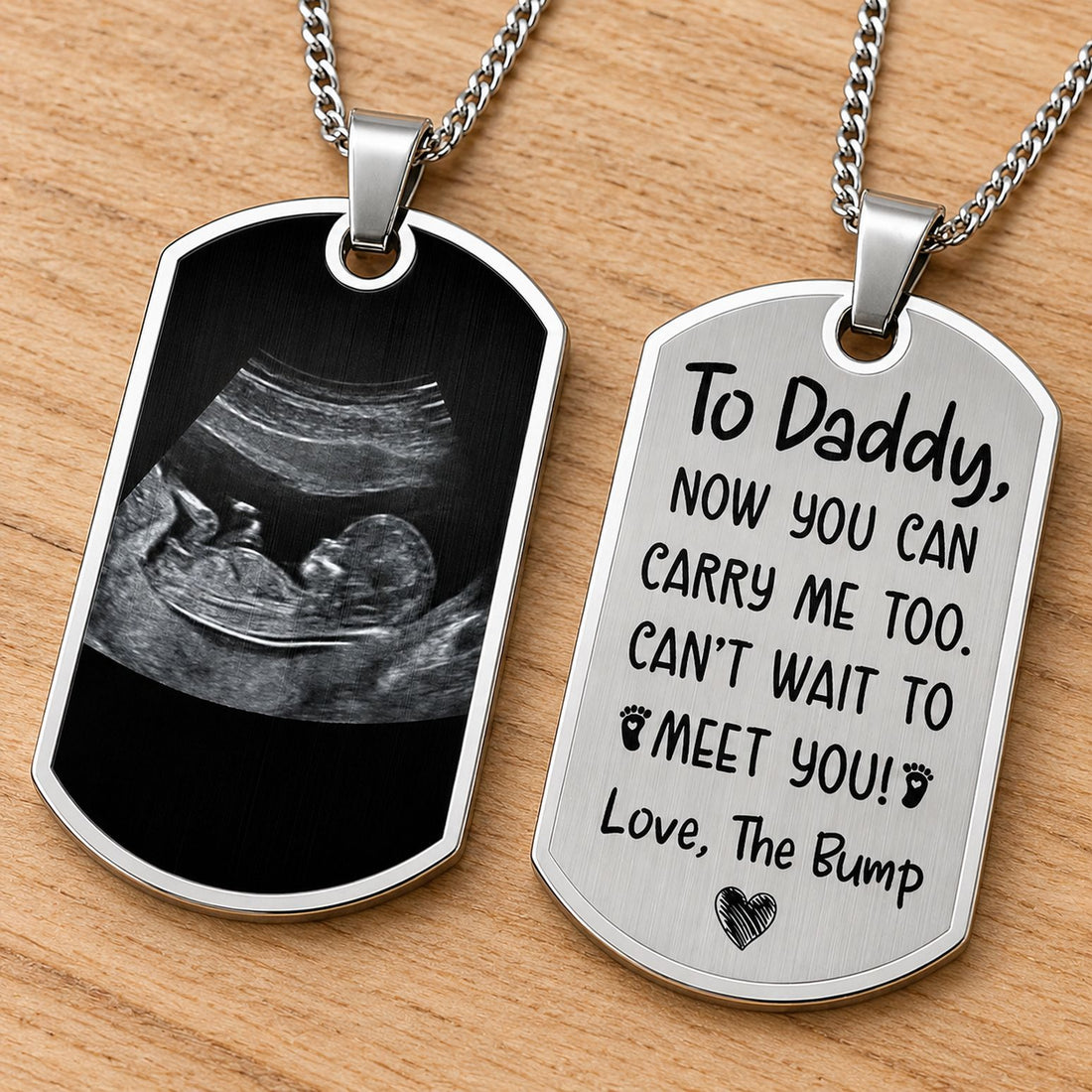 Macro detail of stainless steel personalized dog tag necklace showing brushed finish and engraving