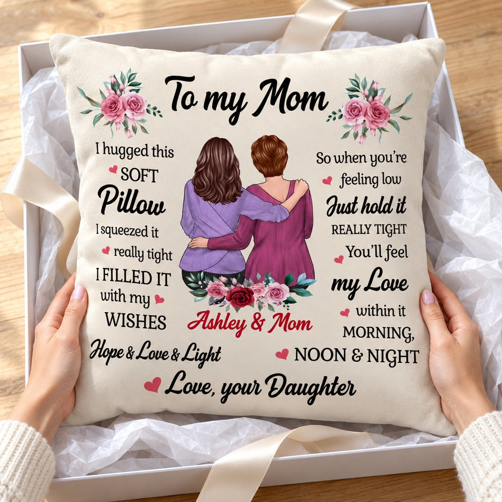 Personalized To My Mom pillow being unwrapped from a gift box with ribbon and tissue