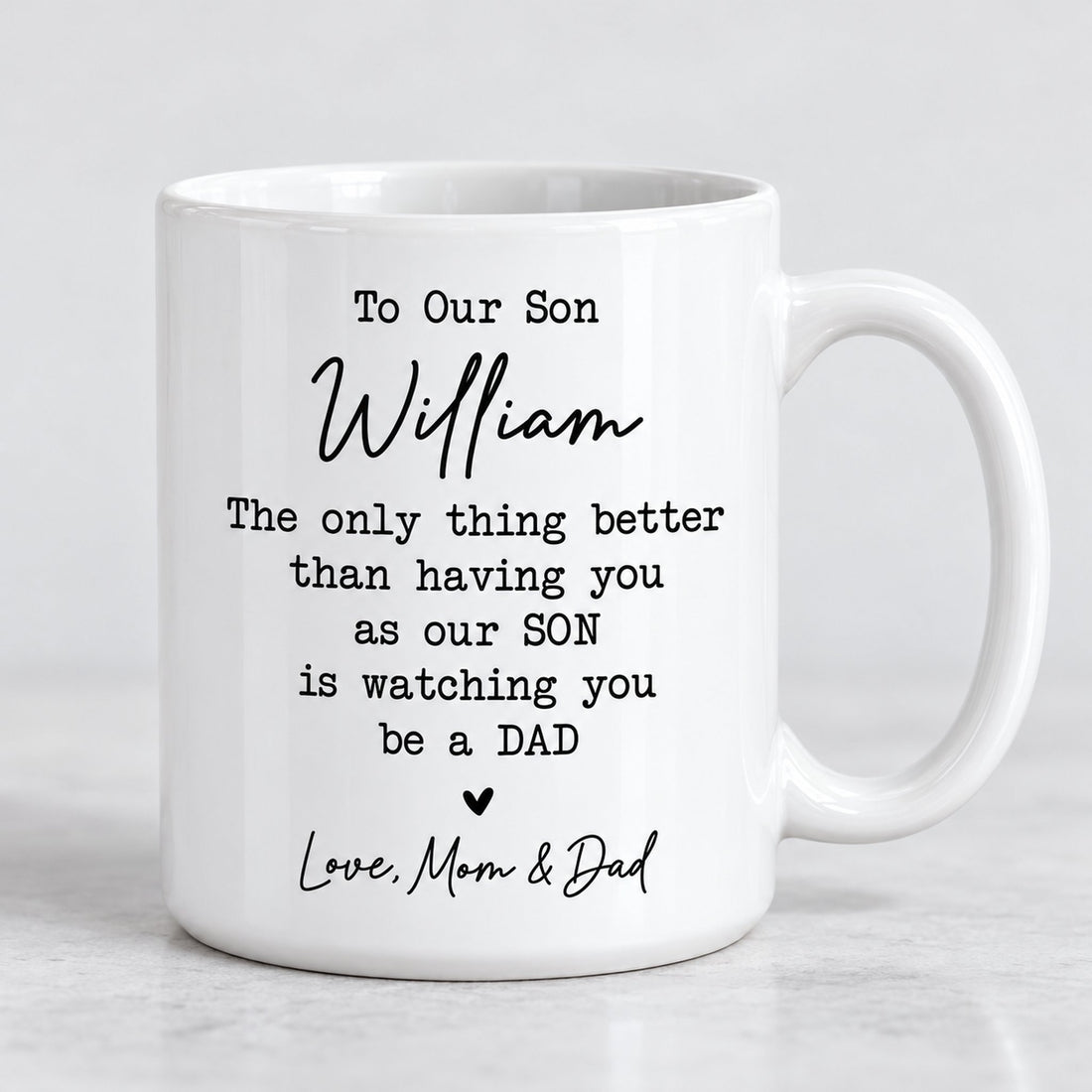 Macro closeup of glossy white ceramic mug showing crisp black personalized text print