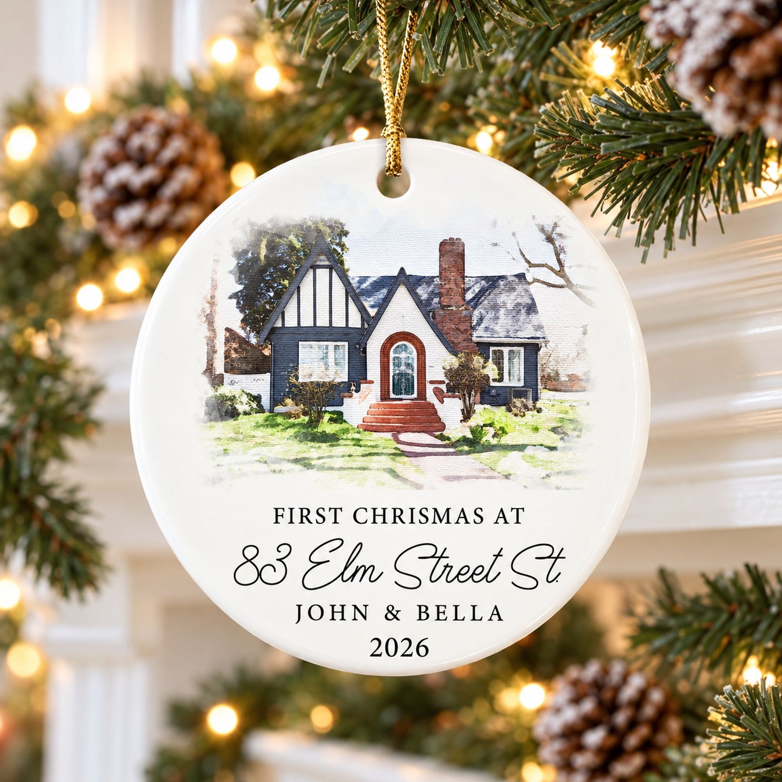 Custom watercolor house ceramic ornament hanging on a holiday fireplace mantel garland