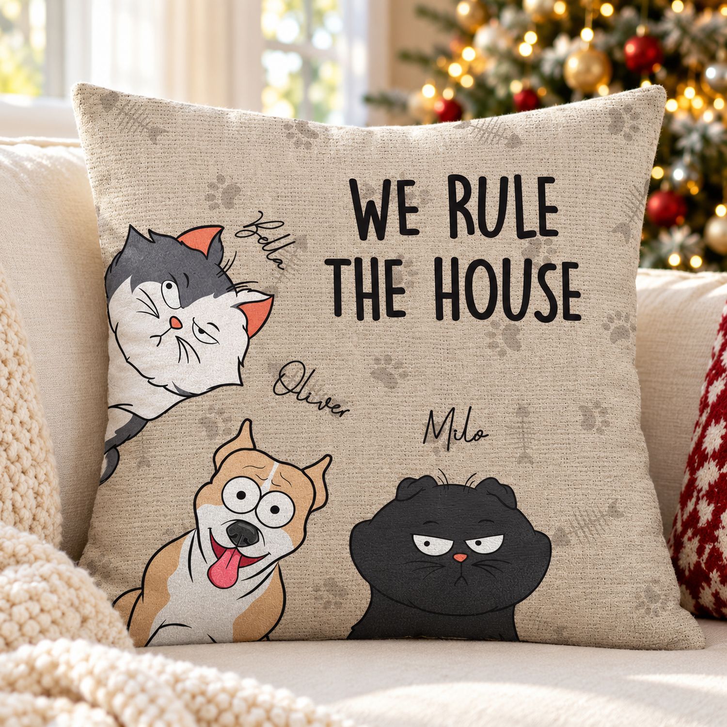 We Rule The House personalized dog and cat pillow on a cozy sofa by a Christmas tree