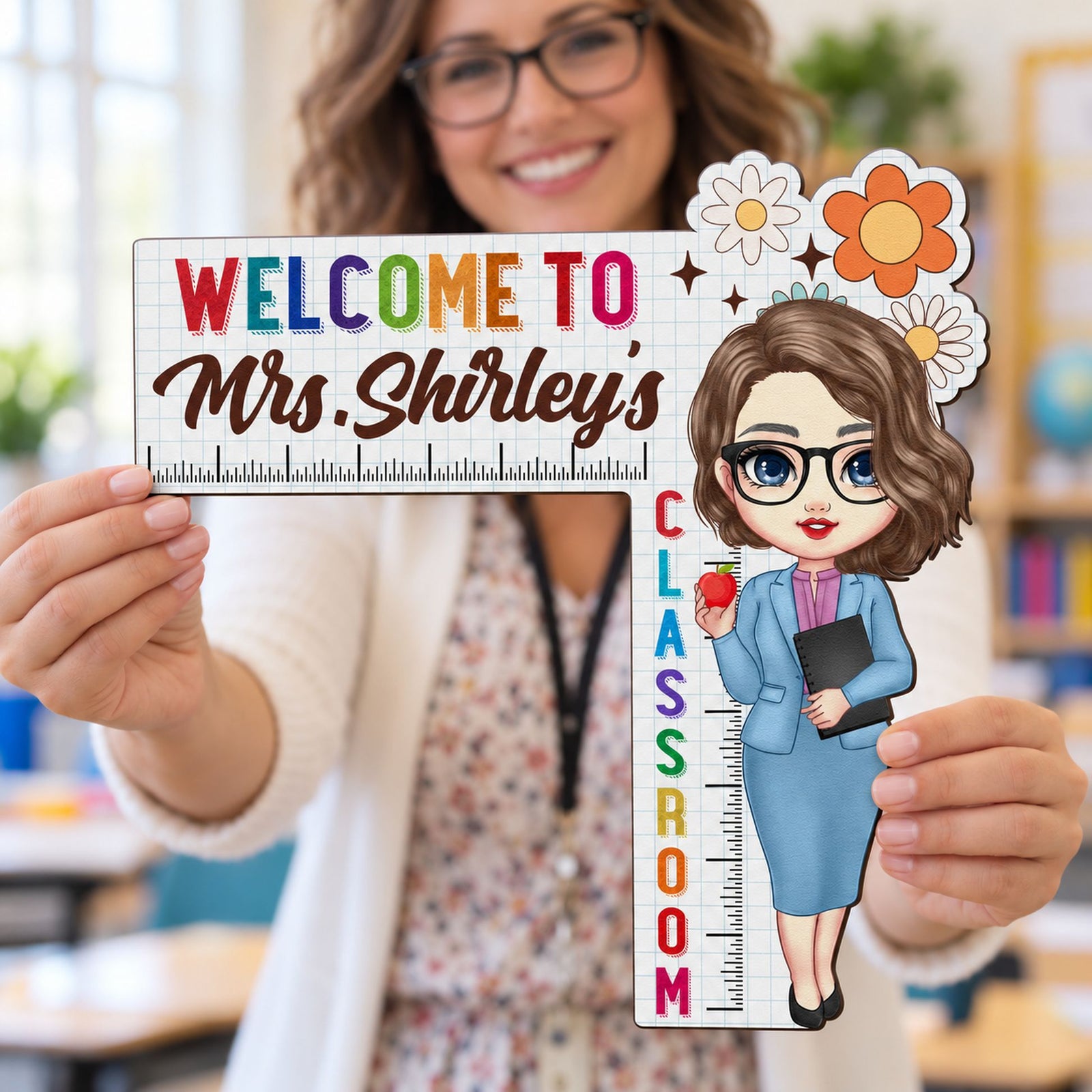 Happy female teacher holding her personalized Welcome To Mrs Shirleys classroom wood sign