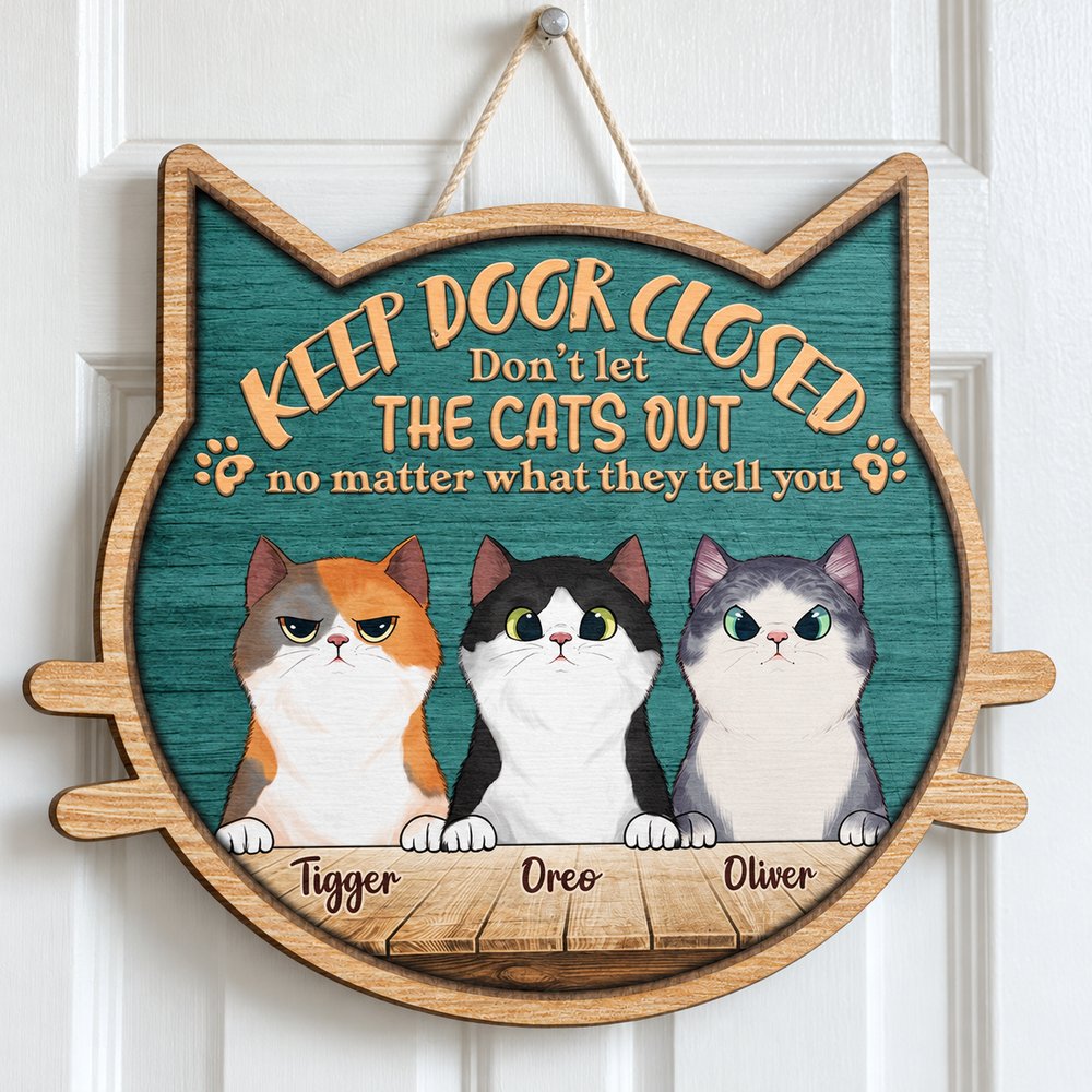 Close up detail of printed woodgrain texture and cut edge on cat shaped wood sign