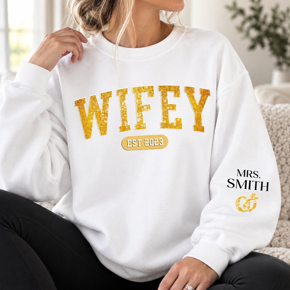 Close up of Wifey Est chest print and custom Mrs Smith sleeve print texture