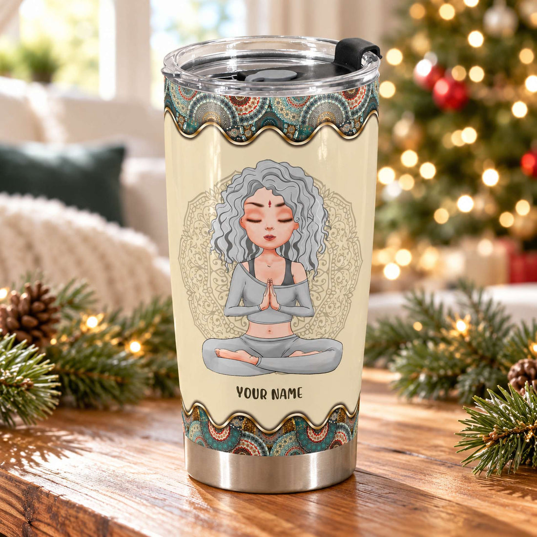 Personalized 20oz yoga tumbler on a festive holiday table with soft Christmas tree lights