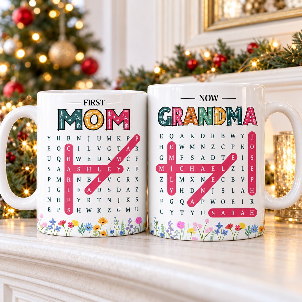 Both sides of First Mom Now Grandma personalized word search mug on a bright holiday mantel