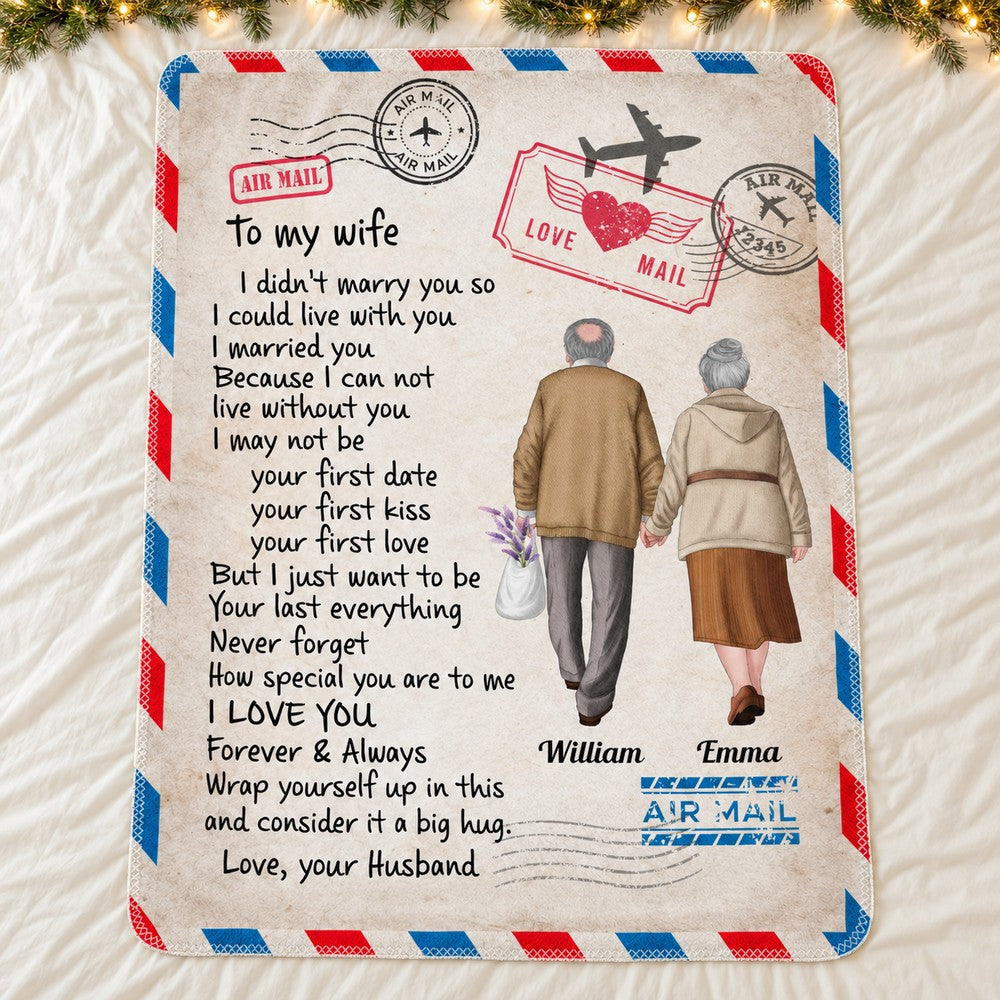 Personalized old couple air mail blanket for wife spread flat on bed with holiday greenery