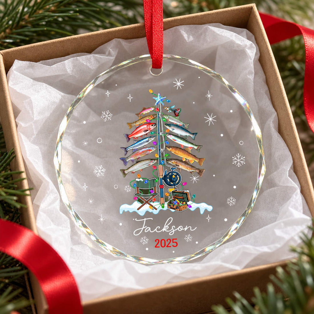 Personalized fisherman glass ornament resting in a tissue-lined Christmas gift box