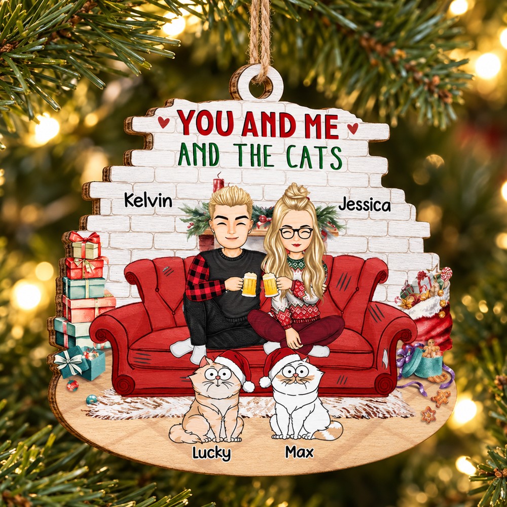 Personalized You And Me And The Cats wood ornament hanging on a Christmas tree branch
