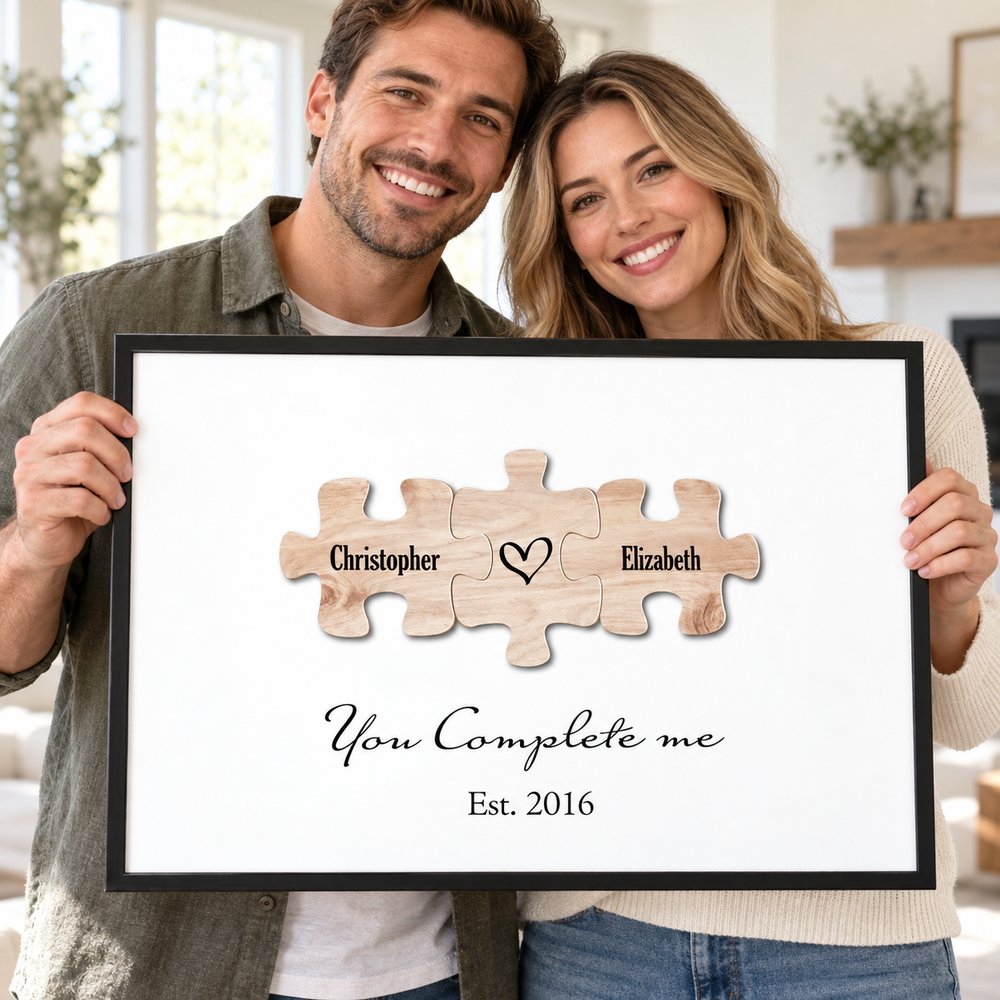 Happy couple holding their personalized You Complete Me puzzle wall art print