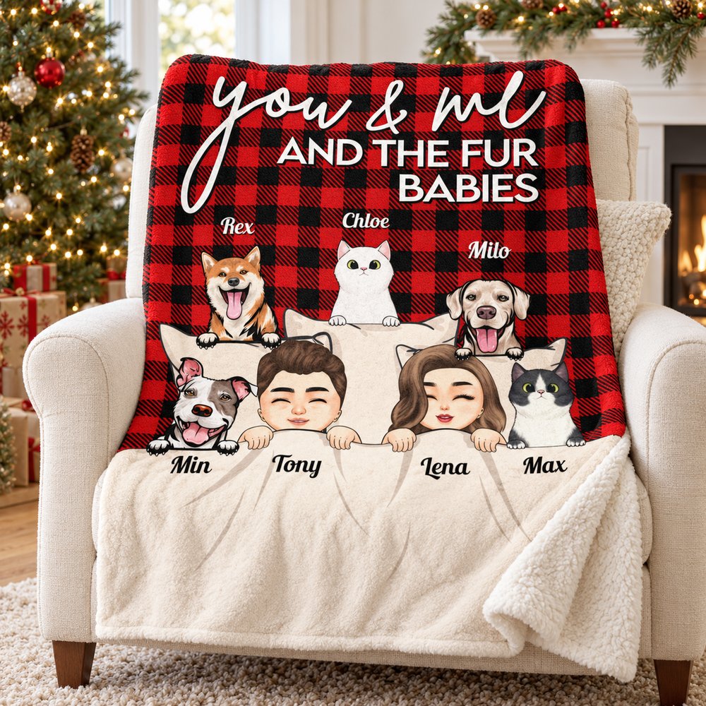 Personalized couple and fur babies buffalo plaid blanket draped on armchair by a Christmas tree