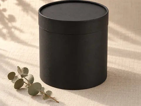 Closed round matte black gift box